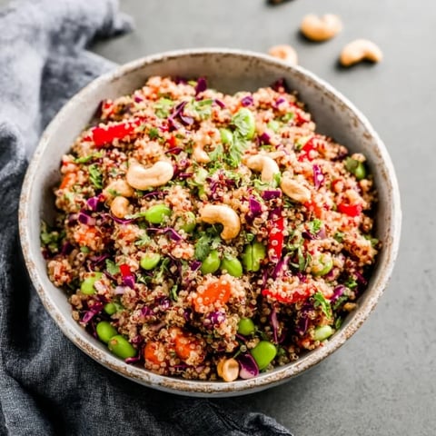 A bowl of food with a towel over it.